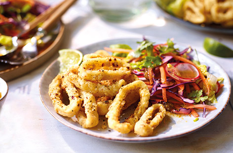 Try our Chinese-inspired twist on classic calamari with this speedy salt and pepper squid recipe. Ready in under half an hour and perfect for entertaining, this quick lunch or dinner combines crispy-coated squid with a fresh veg salad and punchy dressing.