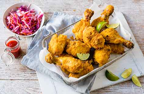 Find out how to make healthy Southern fried chicken in the oven with this clever recipe. Although baked rather than fried, the spicy buttermilk marinade and crunchy panko breadcrumb coating mean that the chicken remains beautifully tender inside yet crisp and golden on the outside - exactly what you want from a simple breaded chicken recipe.