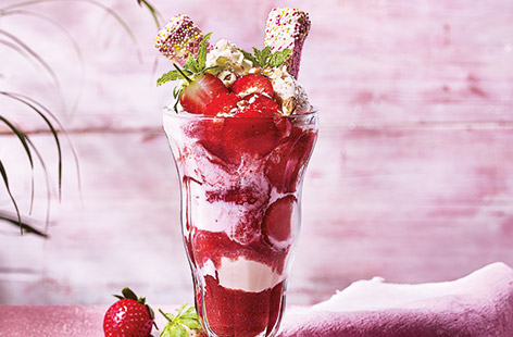 Try a new twist on strawberries and cream with this spectacular strawberry sundae recipe that's perfect for sharing
