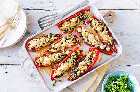 These healt stuffed peppers make a satisfying lunch or dinner option, using lean turkey mince and plenty of fresh spring greens to make a tasty filling.