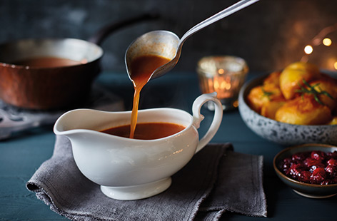 An easy vegan gravy that's full of flavour. Roast the veg with herbs and a bit of tomato purée, before adding vegan white wine, veg stock and the secret ingredient – marmite! Perfect for enjoying alongside a vegan Sunday roast or vegan Christmas dinner.