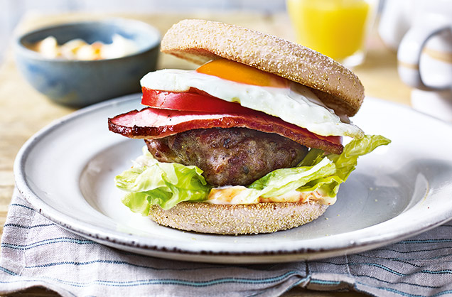 Treat your Dad on Father’s Day with this mighty fry-up muffin for an indulgent brunch. A crisp toasted muffin is piled high with smoky bacon, a juicy sausage patty, perfectly fried egg and a dollop of mayo swirled with chilli sauce for an extra kick.