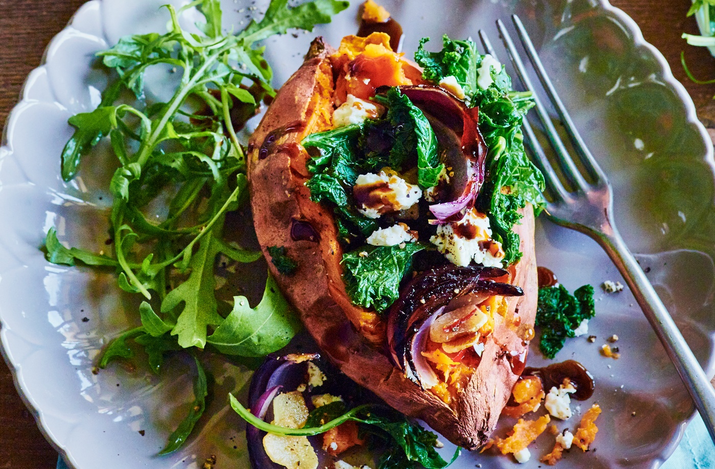 Baked sweet potatoes with kale, feta, chilli and onion recipe