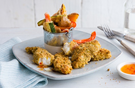 A fun and healthy twist on fish and chips, the whole family will love these crispy cod goujons served with vegetable tempura chips