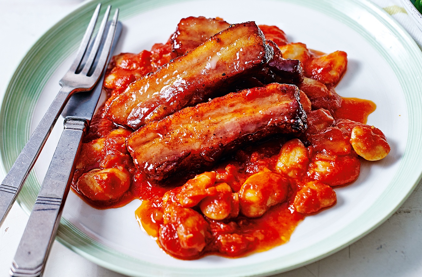 Maple-glazed pork with chilli beans recipe