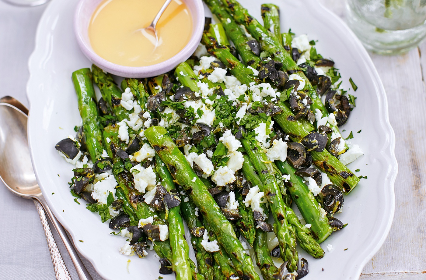 Griddled asparagus with feta, olives and oregano recipe