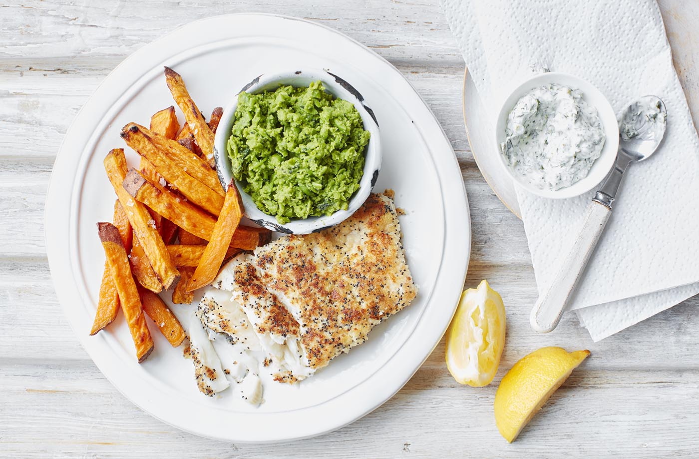 Poppy seed-crusted haddock with sweet potato fries recipe