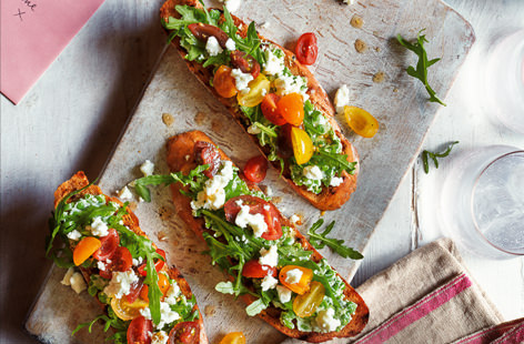 A delicious dinner for two, transport your tastebuds to the Mediterranean with these bruschetta, topped with mashed peas, tangy feta and marinated tomatoes. They take just 10 minutes to make, perfect for lazy weekday evenings