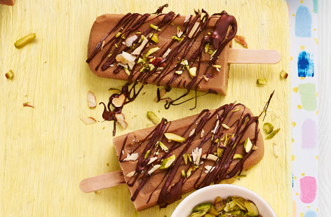 Finished with a drizzle of chocolate and a sprinkle of chopped roasted nuts, these caffe latte ice lollies are a delicious, sophisticated sweet treat that's perfect for a hot summer day - not to mention, they are healthy and a great source of vitamin D