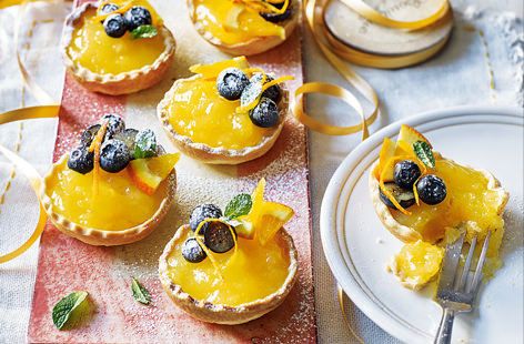A twist on the classic lemon curd tart, this orange version makes a beautiful addition to your Mother’s Day afternoon tea. Topped with blueberries and orange segments and dusted with icing sugar, they taste as good as they look. 