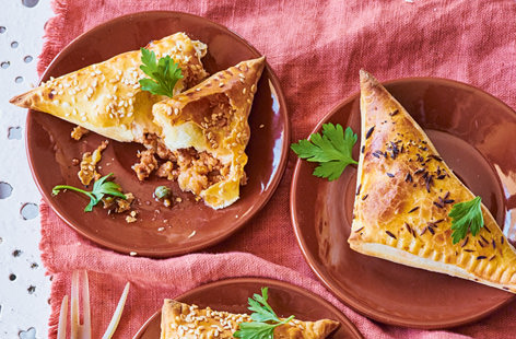 These healthy tapas-inspired empanadas, packed with a mixture of richly-spiced turkey mince, raisins and capers, and finished with a sprinkle of cumin or sesame seeds, are a perfect addition to any al fresco spread