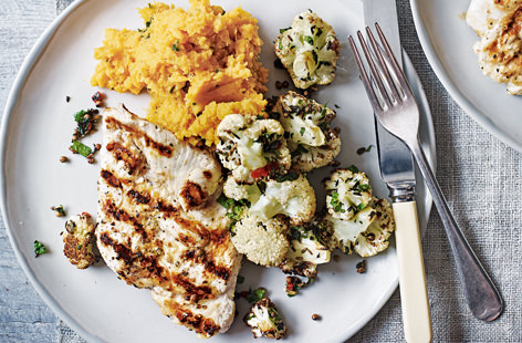 On the table in 30 minutes, this simply griddled chicken dish is the perfect dinner for two. The cauliflower is spiced with fennel, coriander and cumin before being roasted until crunchy around the edges.