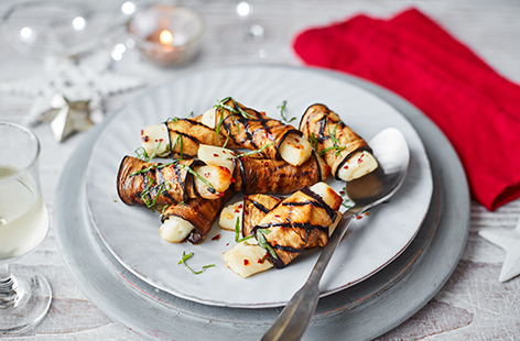 This vegetarian alternative to traditional pigs in blankets is sure to be a winning element to any buffet, and also works perfectly as an easy vegetarian starter. With aubergine and halloumi instead of bacon and sausages, these tasty rolls are still hearty