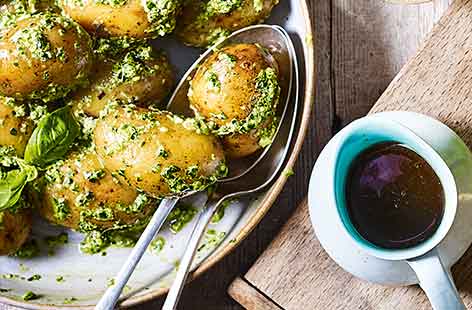 For a moreish Easter side dish, these pesto-dressed new potatoes are bound to be a crowd-pleaser. Homemade pesto is super quick to make in the food processor, using spinach for to get an extra portion of veg.