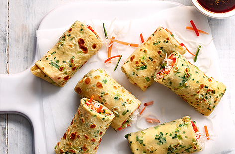 Celebrate Lunar New Year with these simple spring rolls filled with ham, noodles and raw veg. These are great for making with the kids – let everyone customise their own for a fun celebratory feast.