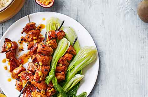 Proving that passion fruit is not just for sweet dishes, these pork skewers are coated in a sweet sticky glaze using fresh passion fruit, soy and a touch of chilli for delectable results.