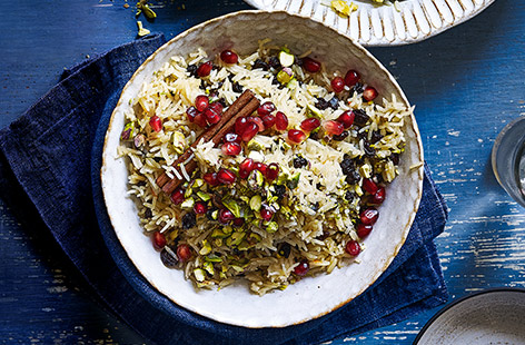 Transform basic rice into a colourful pomegranate pilaf for an easy way to elevate your side dishes. Cooking in the rice in stock adds plenty of flavour, along with juicy pomegranate seeds, sweet currants and pistachios.