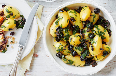 With just four ingredients and two steps, this recipe is a reminder that great food can be easy and simple. When tossed with fresh mint, extra-virgin olive oil and chopped black olives, these potatoes take on a new lease of life
