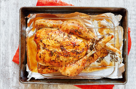 A buttery rub and fragrant stuffing is all you need to roast your chicken to crispy, succulent perfection. Tying the legs together gives a wonderful visual finish that also helps to retain moisture and flavour