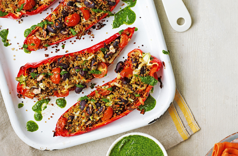 Filled with nutty quinoa, kidney beans, gooey halloumi and fragrant spring onions, these stuffed peppers are sure to bring some flavour to your dinner table. Add some zing with a silky salsa verde and serve with a crisp salad for a gorgeous midweek meal 