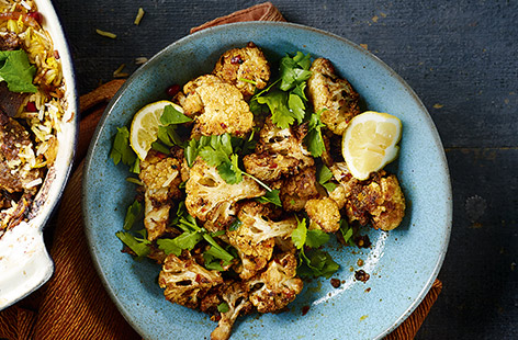 This spicy cauliflower recipe makes the perfect Indian side dish for part of a curry night feast. The cauliflower is simply tossed with fragrant dried spices then roasted until golden and tender.