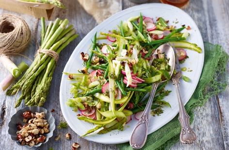 Let the earthy flavour of tender asparagus shine in this healthy salad dressed with fresh ginger, chilli and lime. Hazelnuts and peppery radishes bring a satisfying crunch to this speedy salad that can be made in just 15 minutes