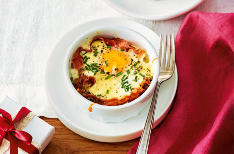 Served up in gorgeous little ramekins lined with crispy bacon, these egg cups are a heavenly breakfast treat to surprise a loved one with.