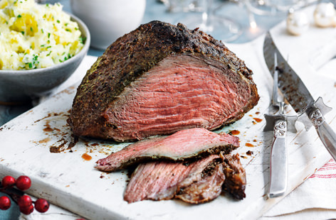 An intense mix of mustard powder and decadent dried porcini mushrooms elevates this classic roasting joint into a festive showstopper