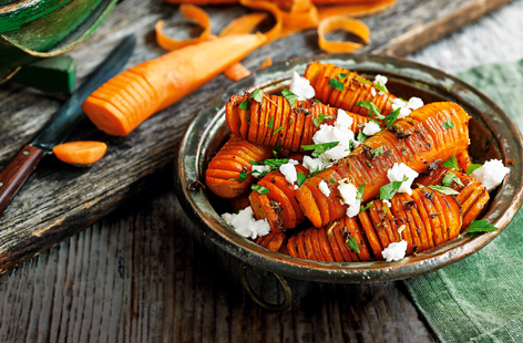 Upgrade your classic roast side with these visual hasselback carrots. The earthy vegetable tastes amazing seasoned with warming cumin, fragrant fennel and glazed with honey for a crisp finish