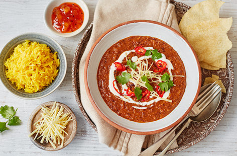 Brighten up dinner with this vibrant Indian-inspired dish that's bursting with the rich flavour of fragrant spices .