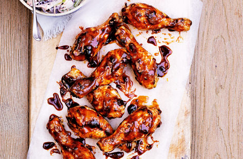 Get ready for a finger-licking treat, with these sticky, soy glazed chicken pieces. Cooked to perfection on the barbecue, they are served with a creamy blue cheese slaw that cuts through the richness of the marinade perfectly