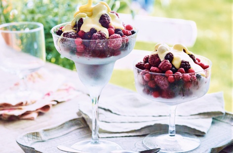 There's surely no better way to top off a bowlful of sharp, frozen summer berries than by drizzling over a creamy, hot white chocolate sauce. This simple pud melts together in the dreamiest, most decadent way