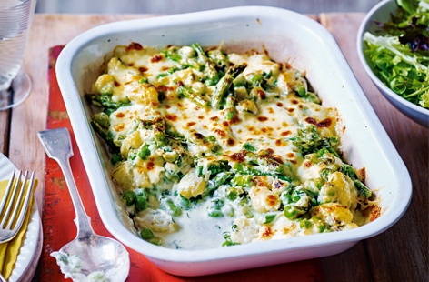 Dive into this creamy, cheesy bake packed with pillowy soft gnocchi, vibrant peas, broad beans and asparagus, and plenty of punchy, aromatic herbs. A comforting vegetarian recipe that can be whipped up in under 30 minutes – what more could you want