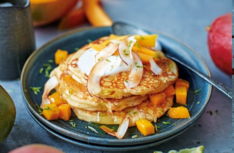 Serve up these quick and easy pancakes as a brilliant breakfast in bed or brunch. Topped with sweet mangoes, creamy coconut and sharp lime these buttermilk pancakes are bursting with flavour