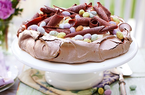 For the perfect Easter bake, try this delicious chocolate meringue nest topped with mini chocolate eggs, indulgent double cream and milk chocolate shavings. This showstopping Easter recipe is the perfect sweet treat to share with the family