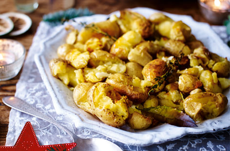 Lightly crushed and flavoured with garlic and thyme, these crispy potatoes are an interesting spin on the classic roasties - perfect to serve as part of your festive menu this Christmas.