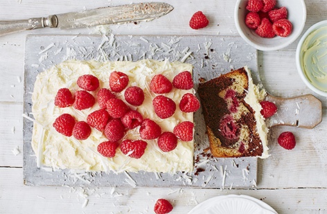 A match made in heaven – this decadent marble cake swirls creamy white chocolate and rich dark chocolate cake batter together and is dotted with bursts of tart raspberry, which cuts through the sweetness perfectly