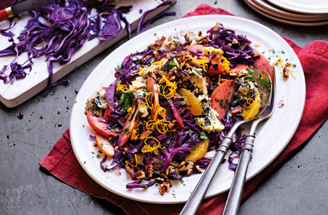 Set the scene for your Christmas lunch with this vibrant salad. Sweet red cabbage tastes heavenly matched with tangy blue cheese and roasted pecans in this festive starter. 