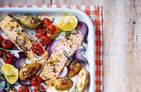 Baking salmon is a fab way of infusing tons of flavour, and this simple one-tray main is seriously easy to make. Teaming up with perfectly roasted Jersey royals, sweet cherry tomatoes and plenty of sharp lemon, really lifts the delicate flavour of salmon