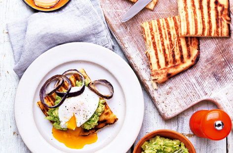 Who says waffles and eggs are just for breakfast? This simple yet delicious brinner (that's breakfast for dinner) layers golden waffles with creamy avocado, perfectly poached eggs and crispy fried onions.