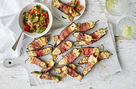 Snacking at its finest – baked jalapeño peppers filled with gorgeous cream cheese, all wrapped in crispy prosciutto and served with a fresh tomato and spring onion salsa. Perfect as a shareable starter or light bite, this snack idea is really satisfying