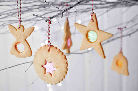 These cute Christmas biscuits will look so pretty hanging from your tree and you're sure to enjoy tucking into them too! These homemade biscuits will last up to two weeks if stored in an airtight container, so can be made well in advance.
