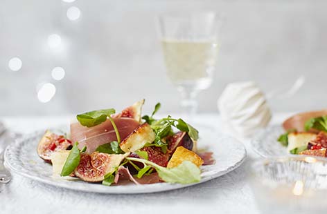 Halloumi, Serrano ham and figs come together beautifully in this wintery starter complemented by a dressing that combines fiery chilli and sweet honey. This fuss-free Christmas starter can be ready in just 20 minutes, leaving you more time to relax