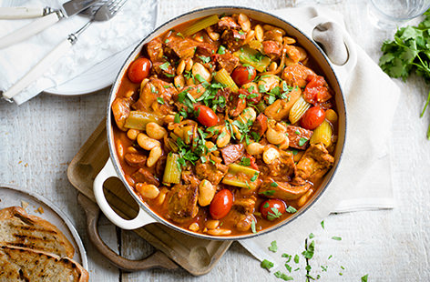 Cooked in a rich tomato sauce with sweet paprika and smoky chorizo, this easy slow-cooker chicken casserole recipe is the perfect comforting family dinner. It's cooked with butter beans, so all you need to serve it with is a little crusty bread for dunking.