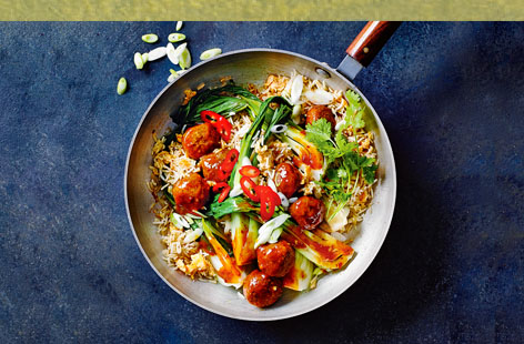 Nasi goreng, the Indonesian stir-fried rice dish, is the loose inspiration for this easy midweek recipe
