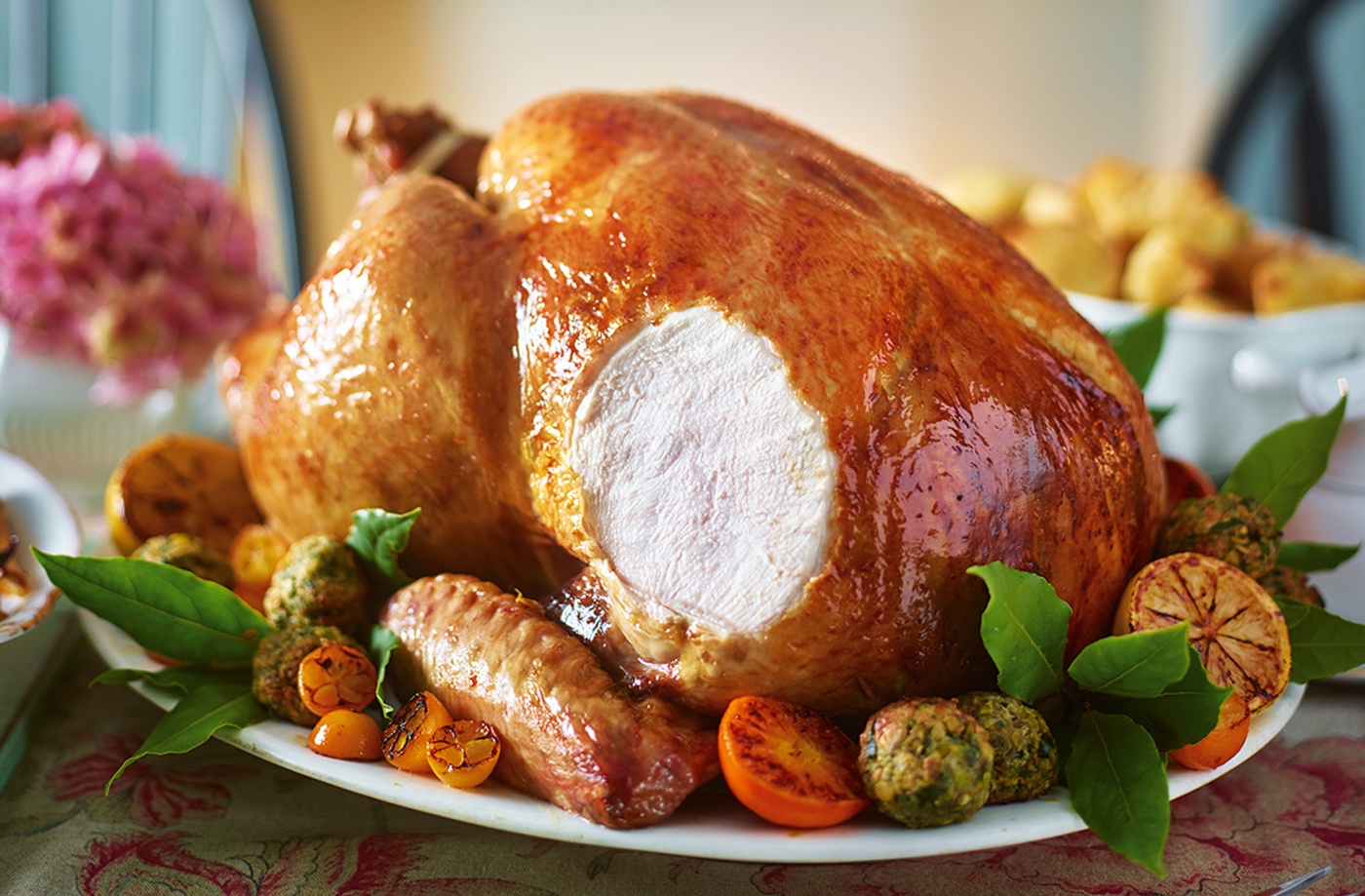 Roast turkey with citrus butter, pistachio stuffing and cranberry gravy recipe