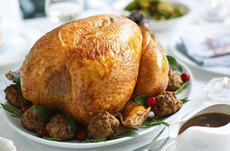 Christmas and roast turkey go together like roast turkey and cranberry stuffing. Orange zest and macadamia nuts bulk out the scratch stuffing in this recipe while our easy-to-follow homemade gravy  ensures that your Christmas dinner spread will come together just nicely.