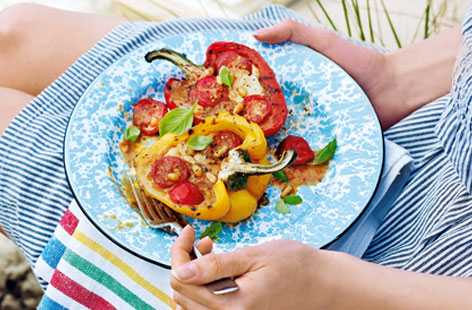 Chargrilled pepper halves become little edible 'bowls', filled with mozzarella, cherry tomatoes, pinenuts and pesto. To cook, the pepper halves and their fillings are encased in foil then barbecued until the cheese has melted to perfection and the tomatoes have burst a little.