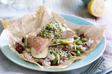 For a taste of luxury any night of the week try these healthy pesto salmon parcels with rice and green beans.