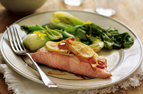 Just five ingredients make up this zingy, satisfying Asian fish supper: salmon, chilli, ginger, lemon and soy sauce. The fish cooks in parcels in just 15 minutes so make sure you give your rice a head start if serving alongside.